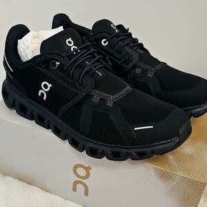 On Running Black Athletic Shoes with Rugged Design